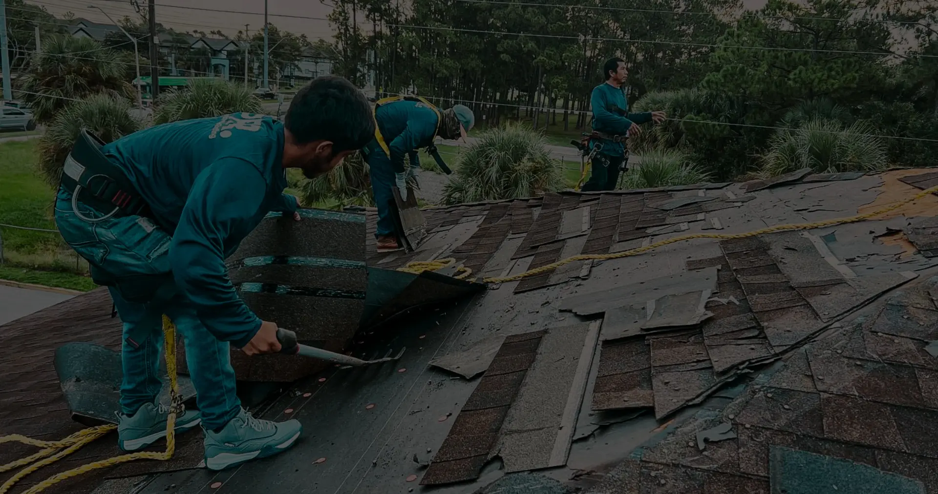 Roofer installing shingles during a Professional Roof Replacement Done Right