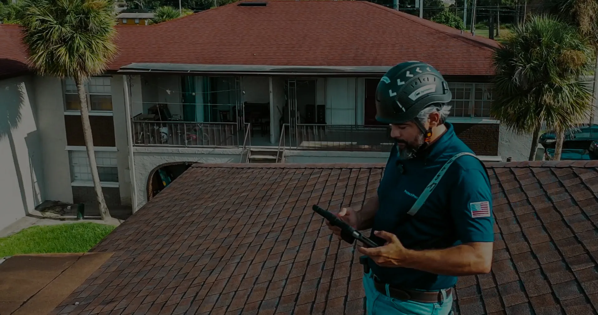 Close-up of a durable red metal roof, showing a high quality installation funded through roof replacement financing made simple.