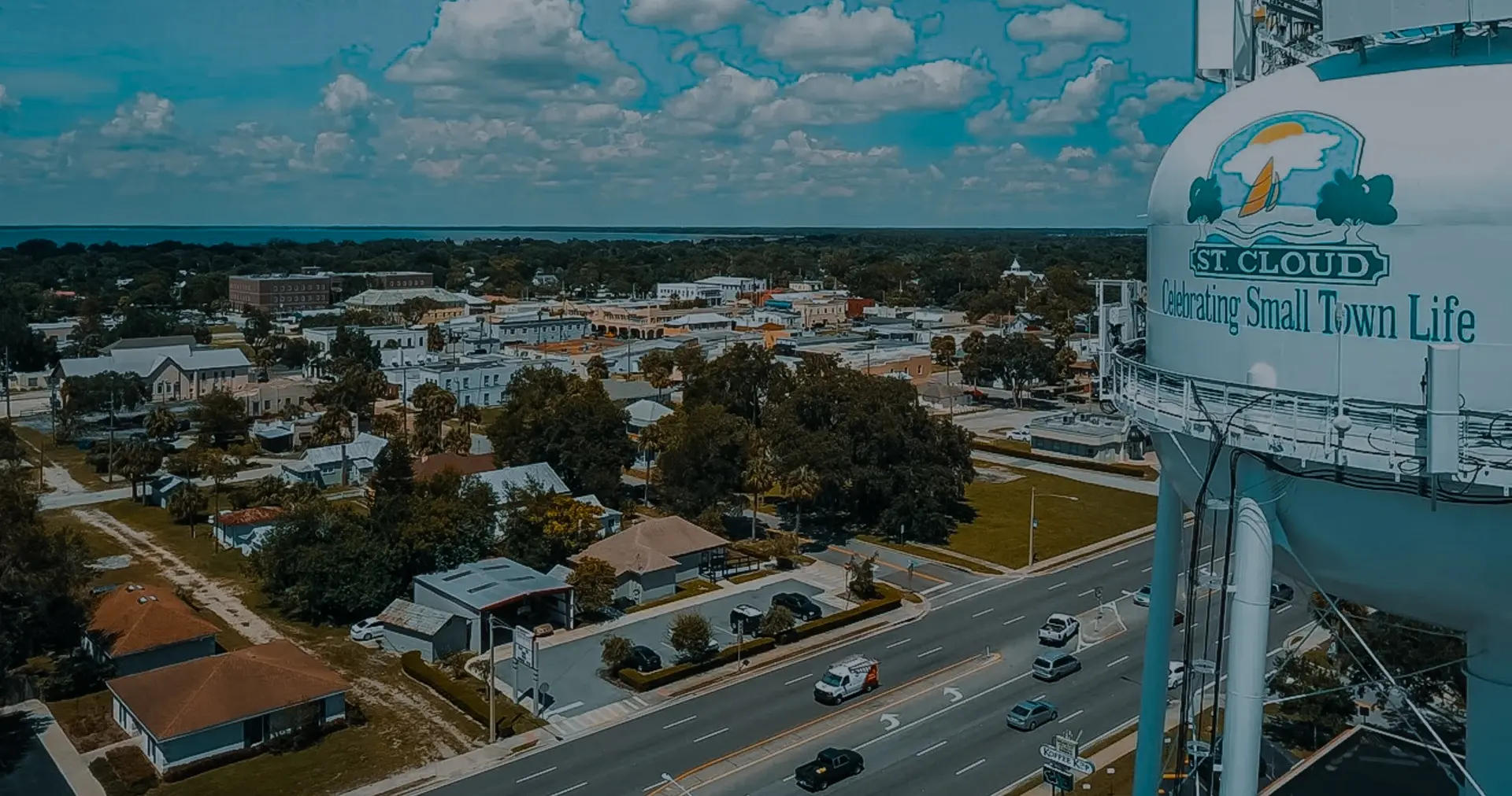 Aerial view of St. Cloud, FL, showing the water tower and rooftops of the community served by our roofing company St cloud.