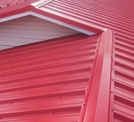 Overview of a residential tiled roof needing roof repair services to fix mismatched and worn tiles.