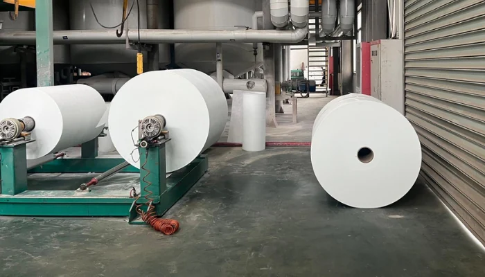 White rolls in an industry to represent the keyword blue tarp material.