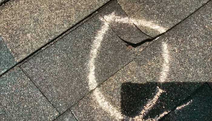 Roof tile damaged by rain to represent the keyword damage shingle.