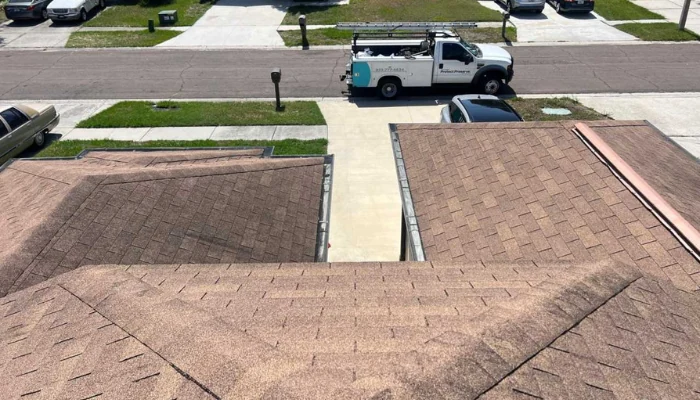 Roof of a house to represent the keyword emergency roof repair.