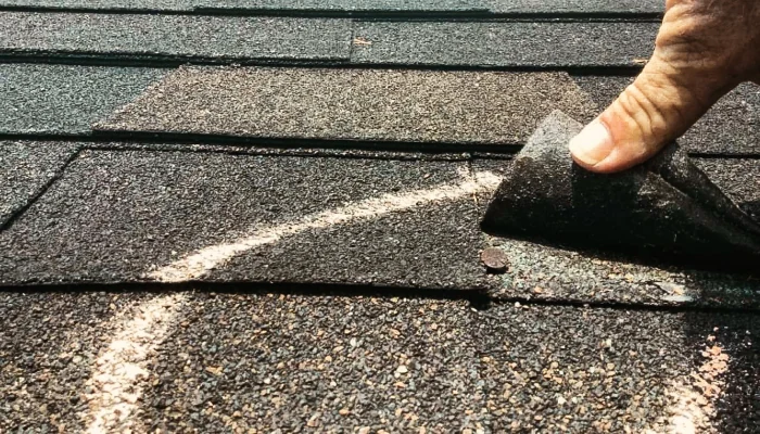 Shingle with a nail to represent the keyword shingle with nail.