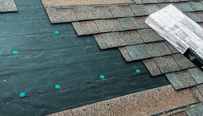 Roof with some shingles being changed to represent the keyword asphalt shingle roof.