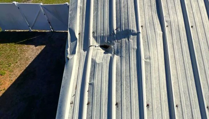 Metal roofing with problems representing the keyword metal roofing materials.