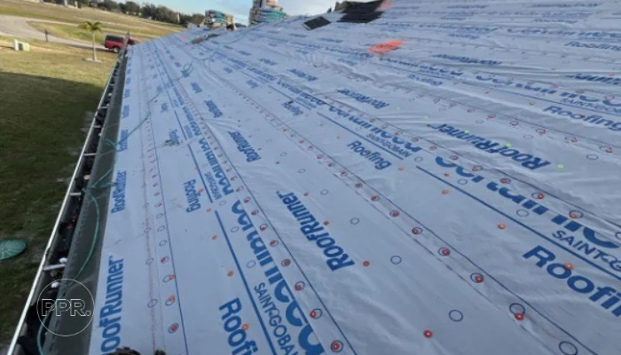 Synthetic material (roofing membrane) to represent the keyword synthetic roof underlayment.