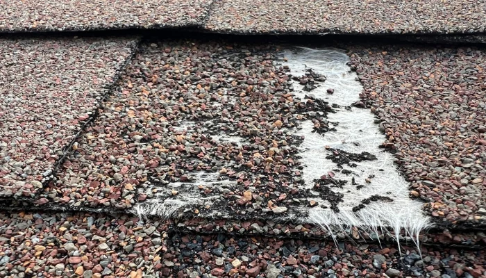 Roof with lost grunler signs to represent the keyword what causes granule loss on a roof.