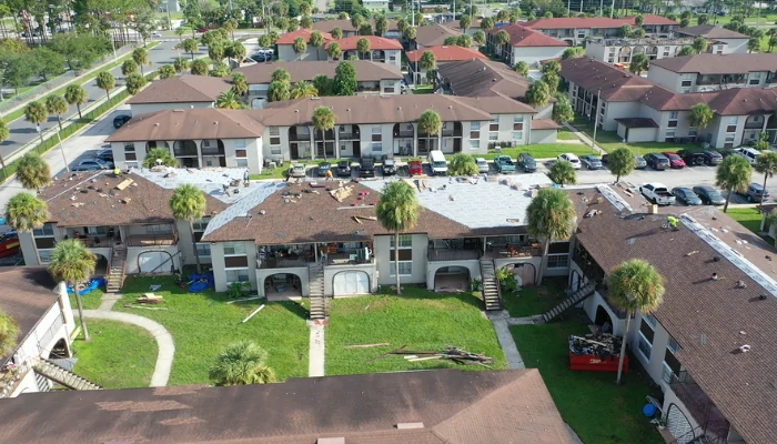 Neighborhood photographed from cimap to display the shigle roofs to represent the keyword commercial roof.
