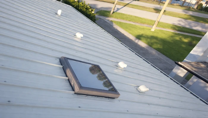 Completed standing seam metal roof on a Florida home, representing durability and final cost considerations for how much are metal roofs in florida.
